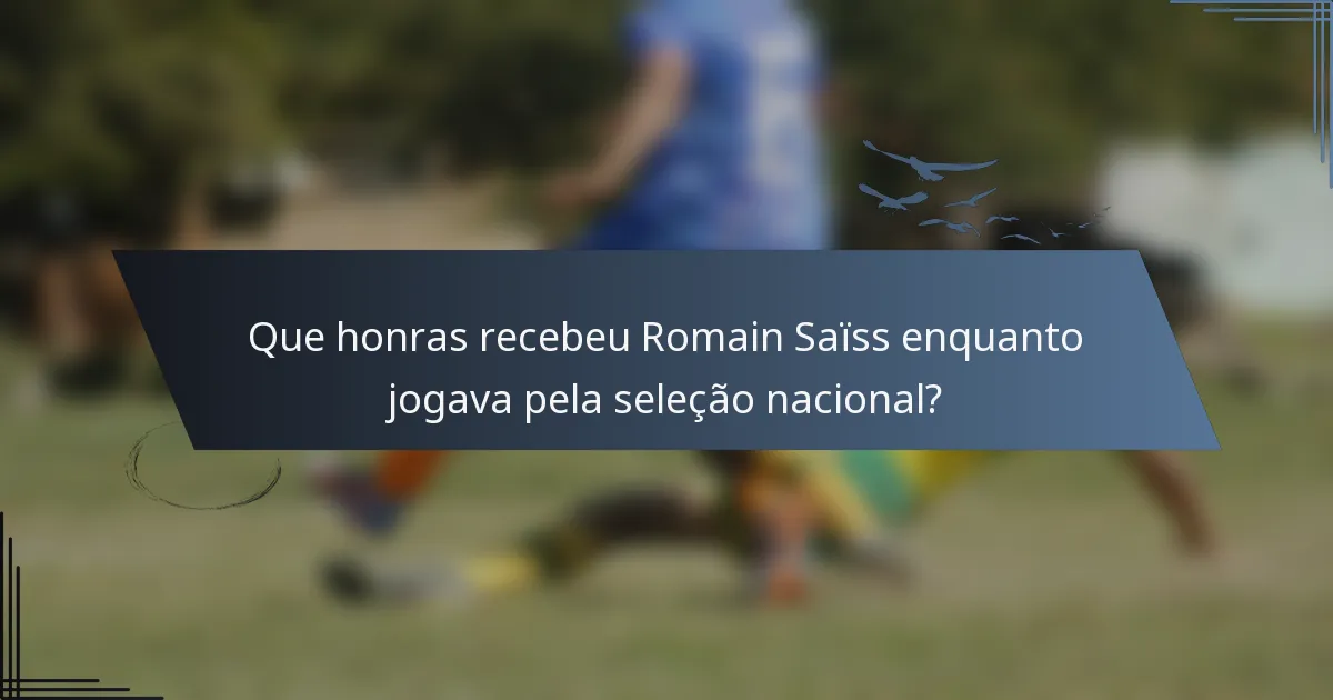 Que honras recebeu Romain Saïss enquanto jogava pela seleção nacional?